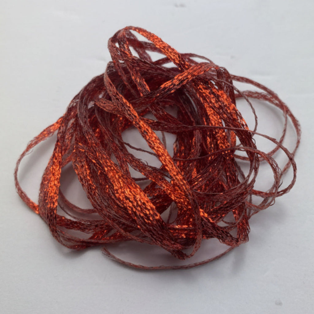Red braid material on a white background