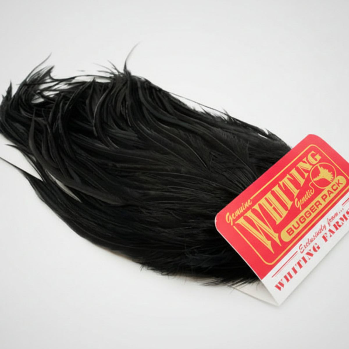 Black feathered product with a red and white label on a white background