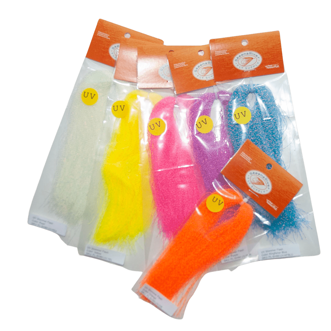 A variety of Flash UV Shimmer materials in different colors packaged in clear plastic bags, each with a UV label and zip-tied in the middle.