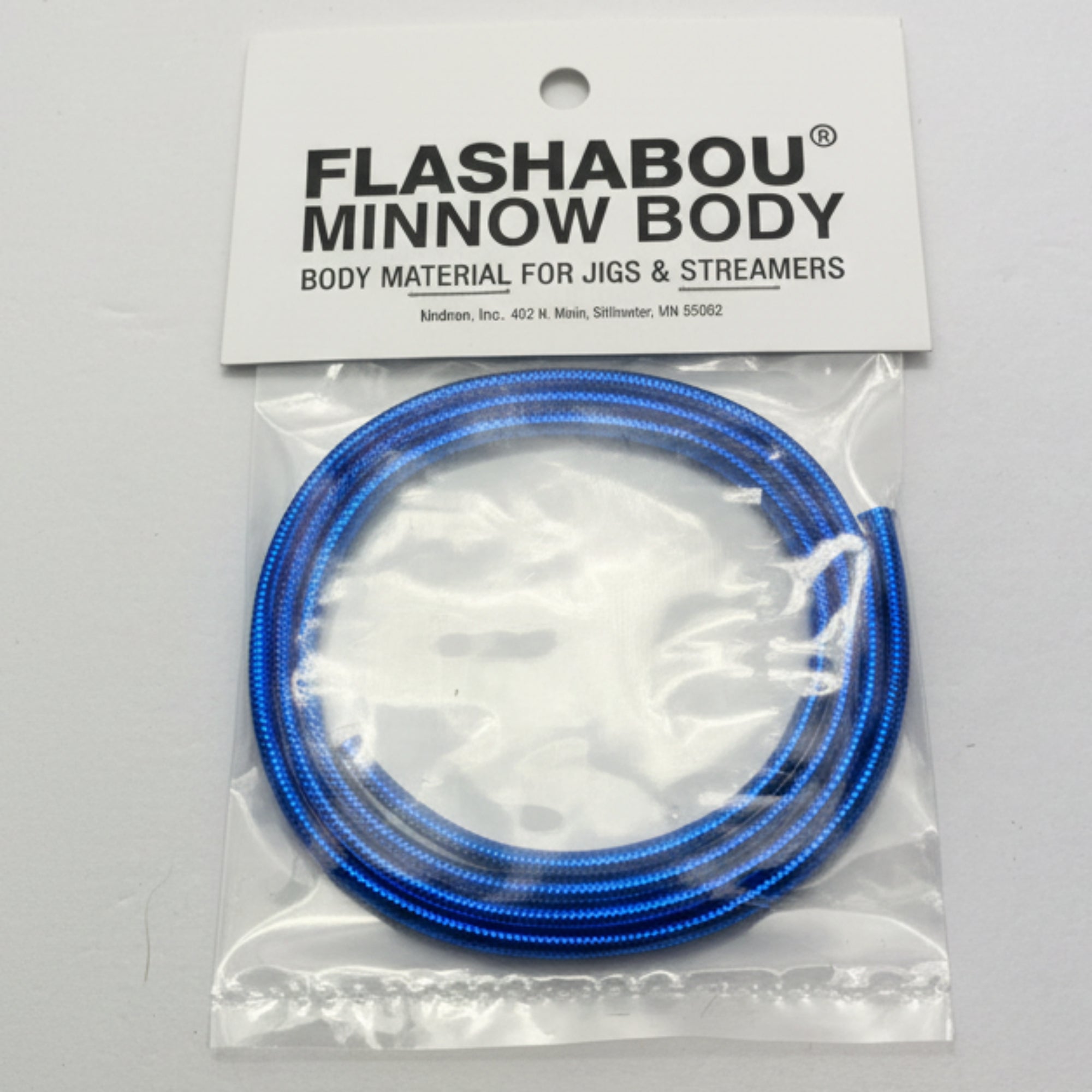 Blue fishing line with Flashabou Minnow Body packaging on a gray background