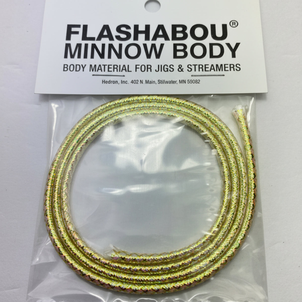 Gold minnow body material for fly tying in packaging with Flashabou brand label.