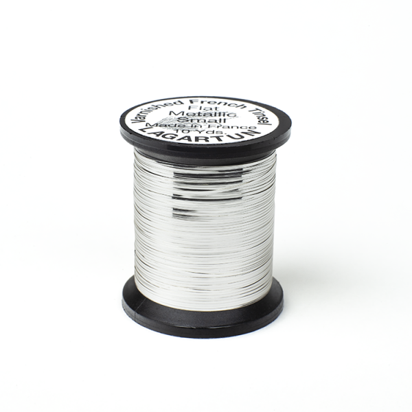 A spool of Lagartun Flat Varnished Tinsel with a metallic gold finish, used for fly tying in fishing.