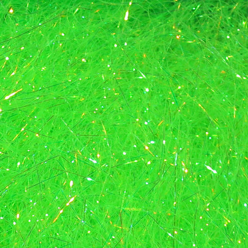 Green textured surface with gold specks