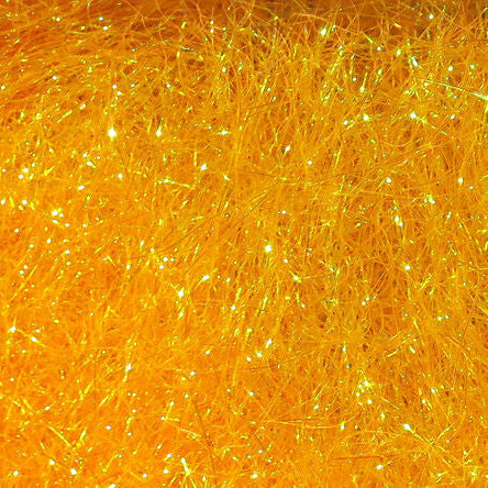 Close-up of bright yellow tinsel with a textured surface