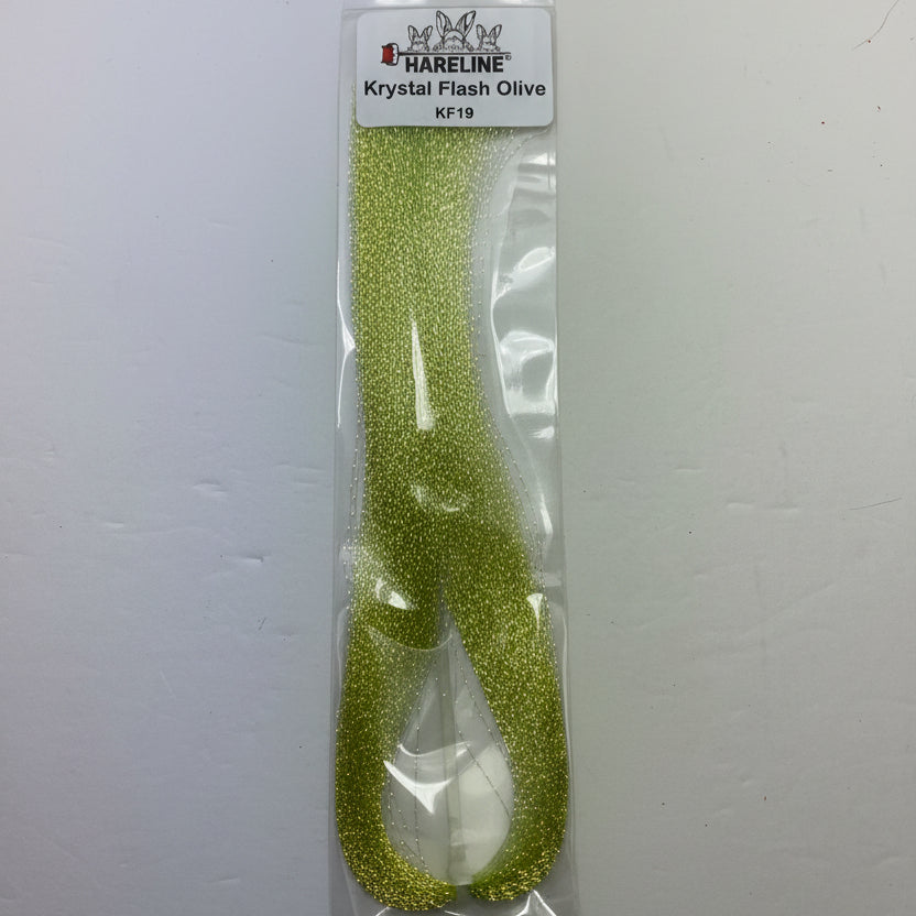 Hareline Krystal Flash in olive on a white background