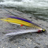 fishing fly tandem streamer. yellow, white and silver