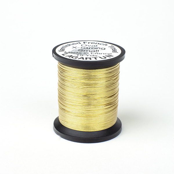 A spool of Lagartun French Varnished Oval Tinsel with a gold-colored metallic finish, used for fly tying in fishing.