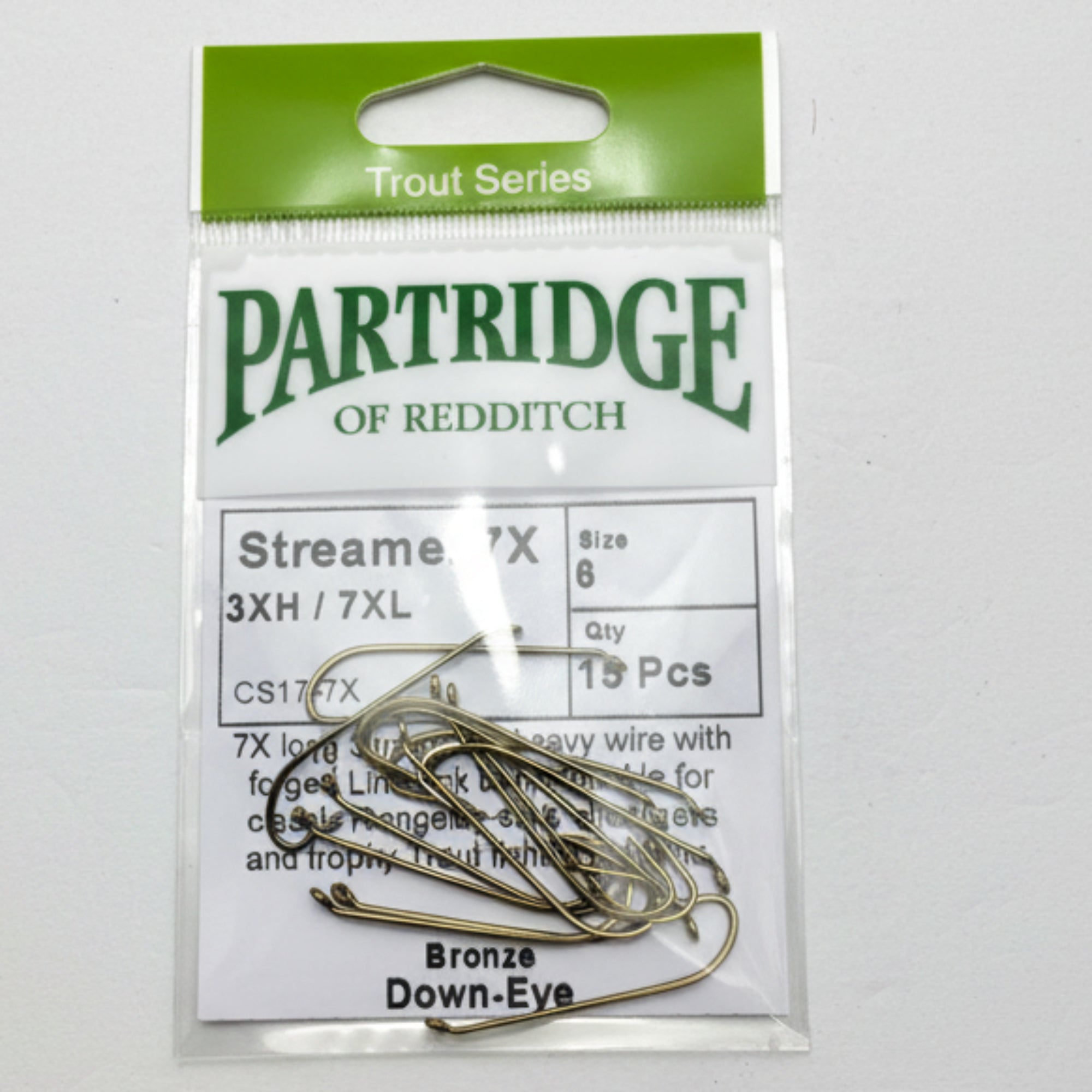 Packaged fishing hooks with Partridge of Redditch branding on a gray background
