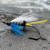 salmon fly. blue charm. white wing with black body and blue throat