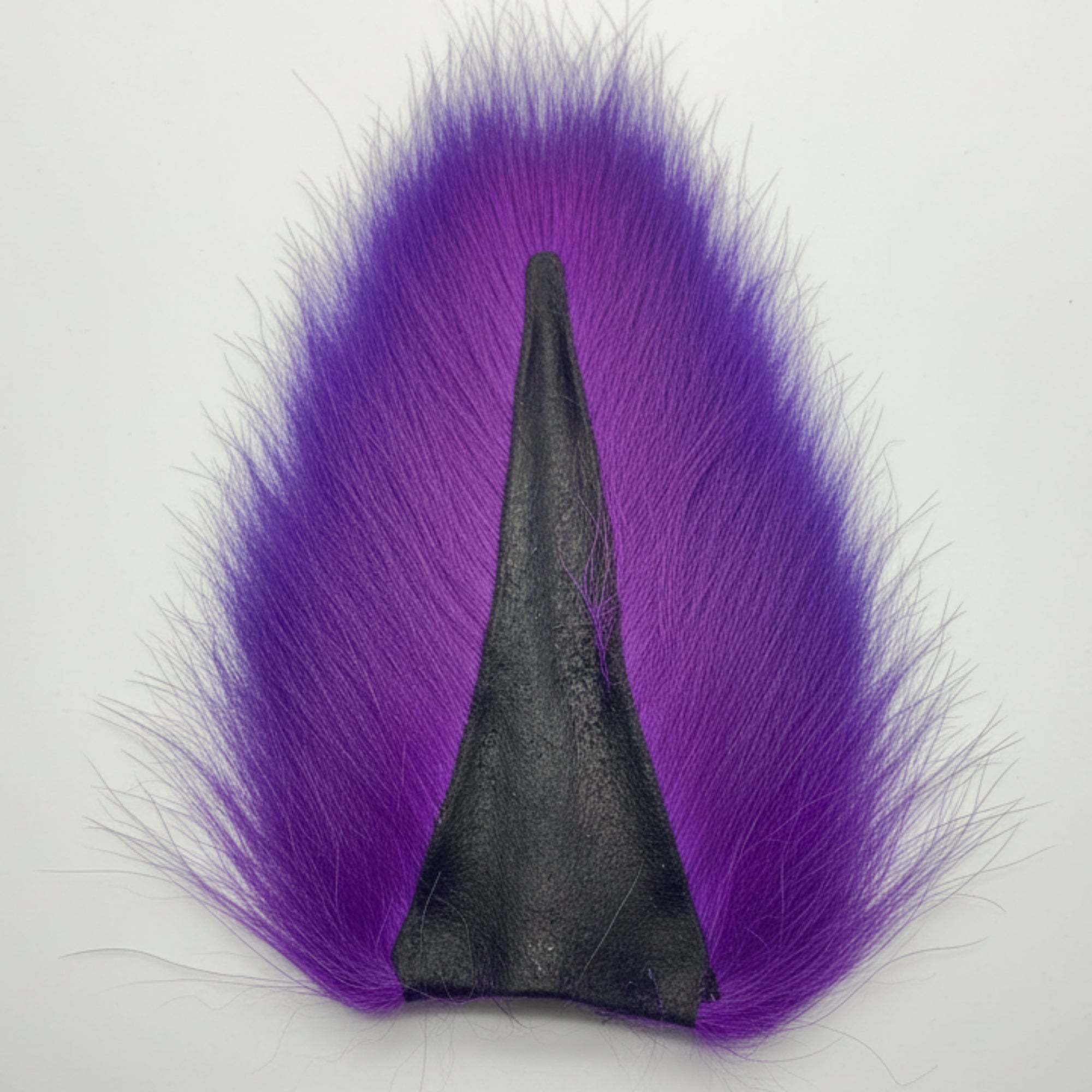 Purple bucktail on a white background