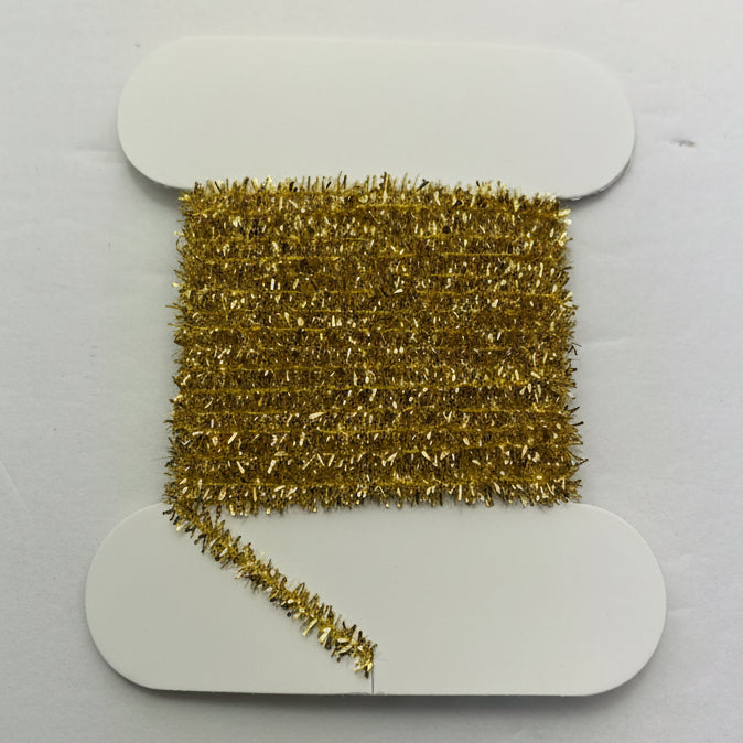 Fly tying material - crystal chenille - gold size medium on a white background