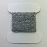 Fly tying material - crystal chenille - silver size medium on a white background