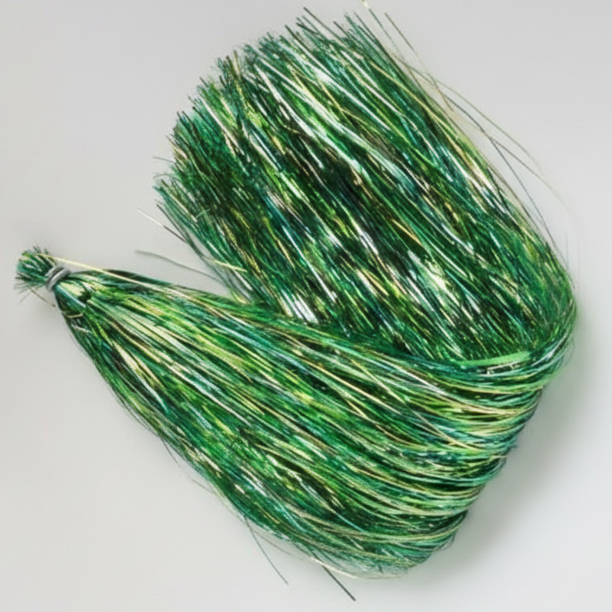 Green and gold braided fishing line on a white background