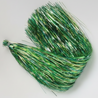 Green and gold braided fishing line on a white background