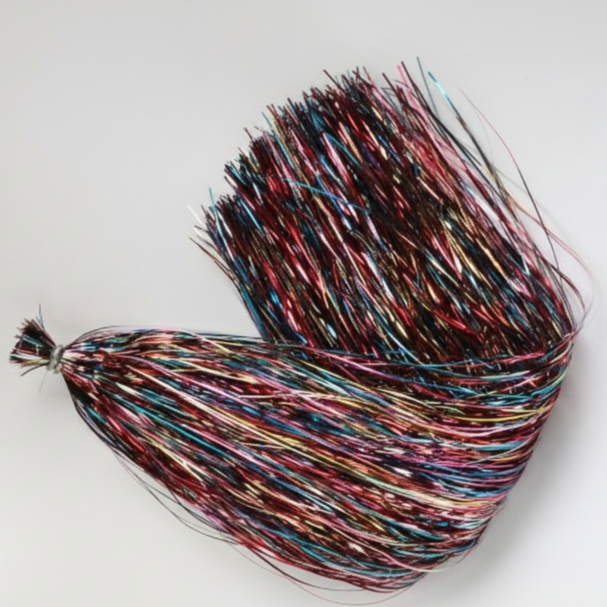 Multicolored tinsel on a white background