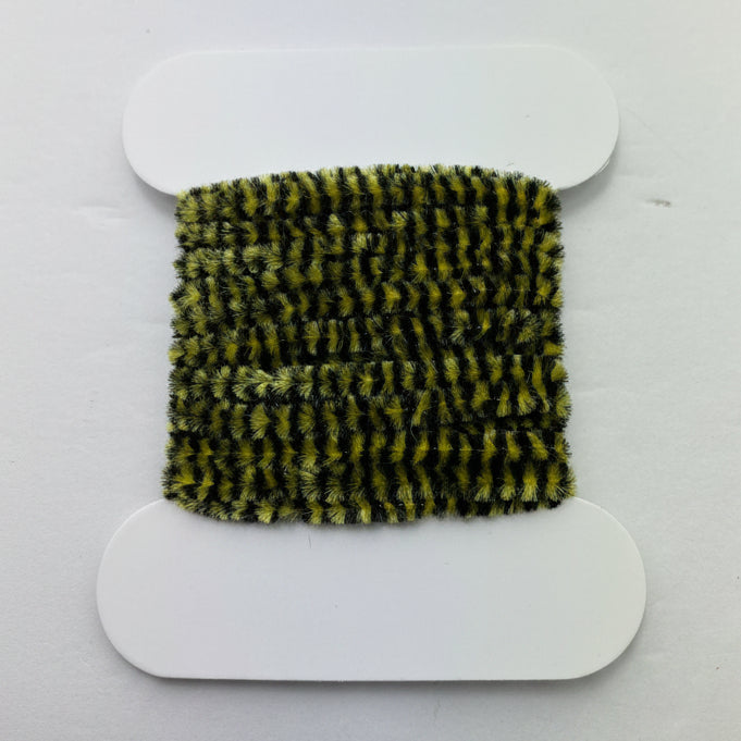 varigated chenille fly tying material. red and yellow on a white background